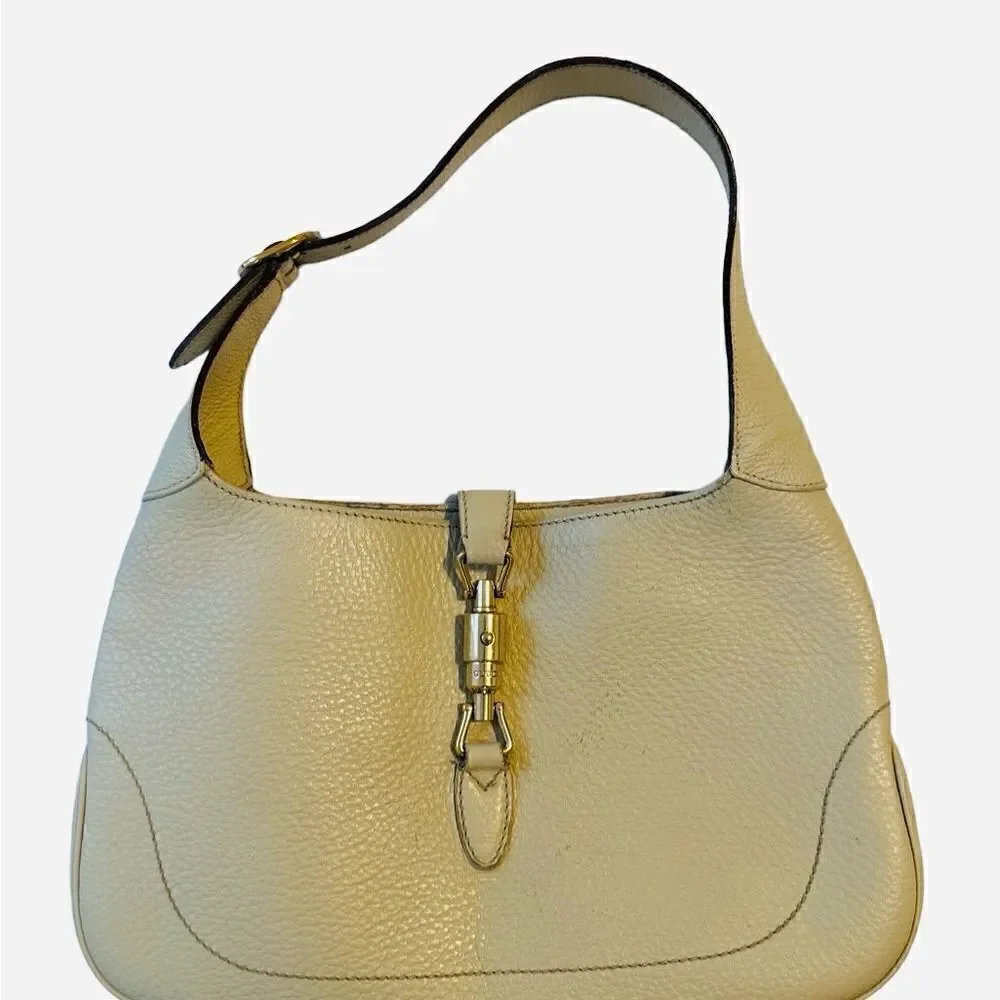 Gucci beiges leather Jackie bag with silver piston lock